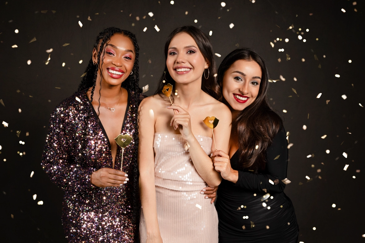 pretty-multiethnic-women-friends-holding-photo-boo-2023-11-27-04-51-42-utc